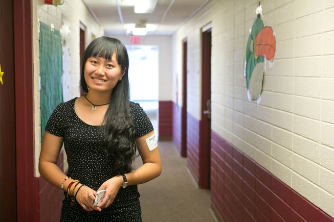 Tingzhao Ming, a 17 year-old International Student from China, majoring in Hospitality Management, moves into the dorms at UNLV during campus move-in day, Thursday Aug. 22, 2013.